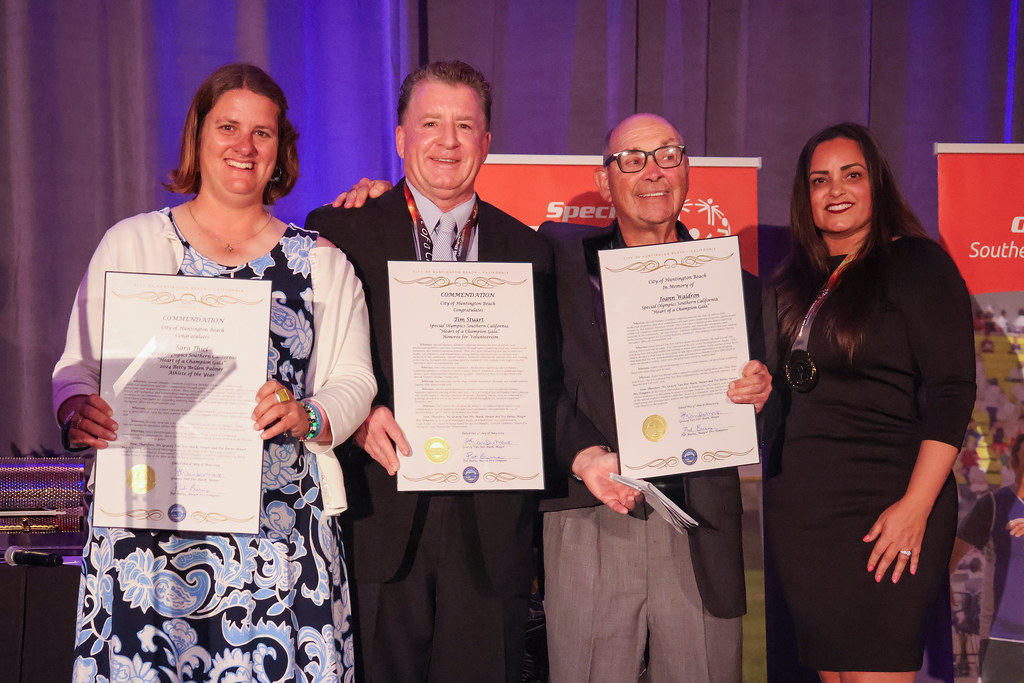 Tim receiving a City of Huntington Beach commendation for Special Olympics volunteerism
